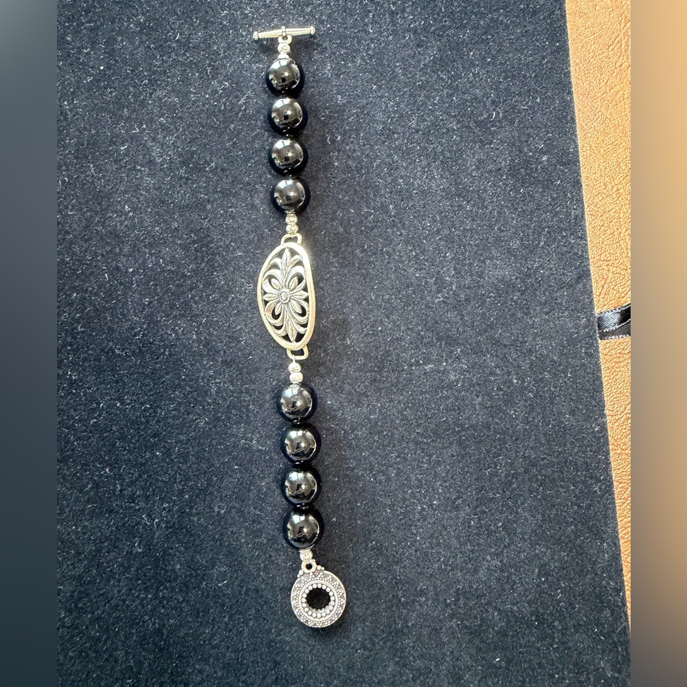 Elegant Black Onyx Beaded Bracelet with 925 Sterling Silver Floral design plate
